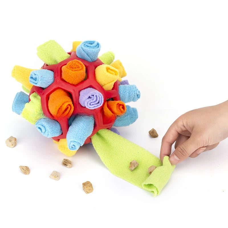 Interactive Snuffle Ball For Dogs with colorful fabric rolls and dog treats visible, perfect for nose work and foraging training.